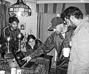 Coach Marcos (with cap) with wife Prissila and students
