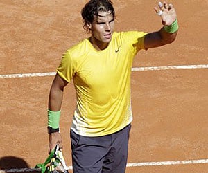 Spain's Rafael Nadal waves to spectators after defeating Croatia's Marin Cilic, during the Italian Open tennis tournament, in Rome. (AP Photo)