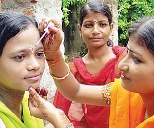 Girls participate in Raja celebrations in Cuttack on Sunday