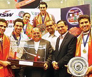The Egyptian squash team with the 2011 World Squash Federation World Cup trophy by  in Chennai. (Express Photo)