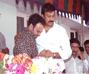 PRP chief Chiranjeevi consolling Nutan Prasad's son at the latter's residence in Hyderabad on Wednesday.