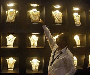 Gold hit a new high on the bullion market on agressive buying by stockists. (File photo: EPS)