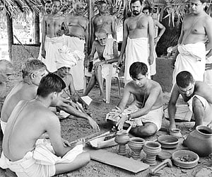 Priests trying to produce fire in the traditional way using wooden tools at Athirathram yagasala at Yetapaka. | Express Photo
