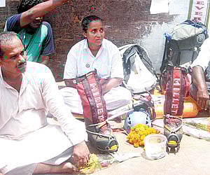 Dash on a silent protest and begging alms (right) in front of Puri’s Jagannath Temple