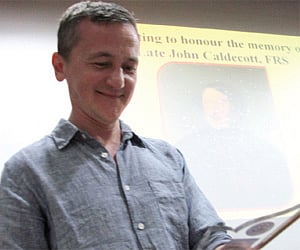 A beaming Nick Caldecott after being honoured with a memento by the Kerala University | EXPRESS
