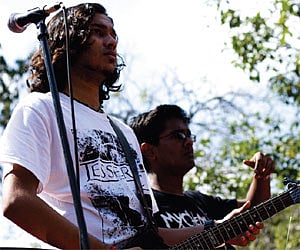 (Clockwise from above) Unscientific signage; approved signage; a different colour of sign board and a parking sign board near a signal  | express phot