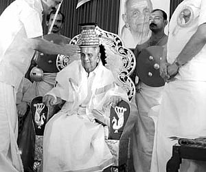 centenarian: Zamorin P K S Raja being crowned with a Krishnanattom kireedom by T V Chandramohan, Guruvayur Devaswom chairman, on the occasion of the 1