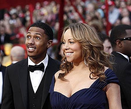 Mariah Carey and Nick Cannon AP Photo/Matt Sayles, File).