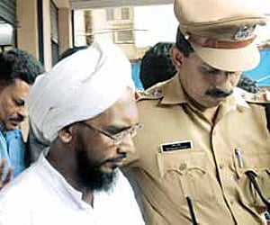 P V Hamsa, first accused in the Chekannur Moulavi case, being taken out of the CBI special court in Kochi on Wednesday.