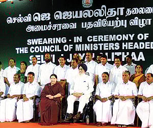 J Jayalalitha and her new Cabinet with Governor S S Barnala after Monday’s swearing-in ceremony.