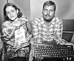 Manasulomata Sujatha and Rahman at the launch of a Telugu computer keyboard in Vijayawada on Sunday