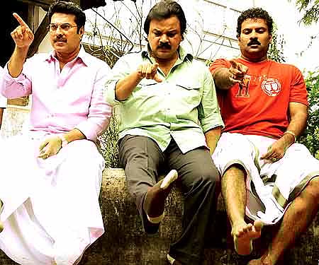 The promotional poster of 'Pranchiyettan and the Saint' with Mammootty in the lead.