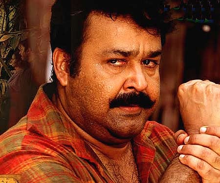 The poster of 'Shikkar' featuring Mohanlal.