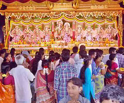 Devotees praying at ISKCON Lotus Temple on the occasion of New Year in Tirupati on Sunday. Express