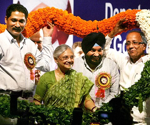 Delhi Chief Minister Sheila Dikshit, Education Minister Arvinder Singh Lovely being welcomed at the 'Delhi State Award Ceremony' during Teacher's Day celebrations in New Delhi. PTI
