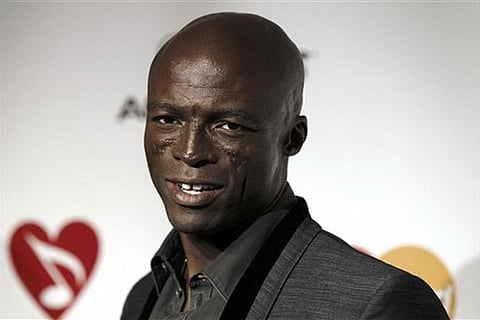 Singer Seal moves on with mystery woman