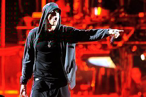 Eminem performs onstage at the 2012 Coachella Valley Music and Arts Festival in Indio, Calif (AP Photo/Chris Pizzello).
