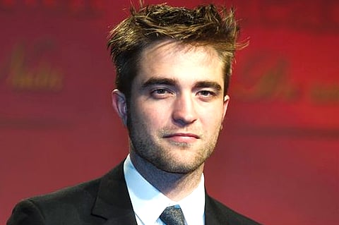 British actor Robert Pattinson arrives at a film premiere of 'Twilight Breaking Dawn Part 1' in Berlin (AP Photo/Markus Schreiber, File).