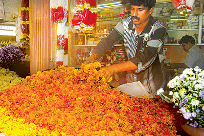 Soaring flower prices fail to dampen atham spirit