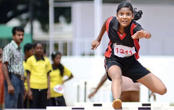 Overcoming hurdles on track with 'quiet' dignity