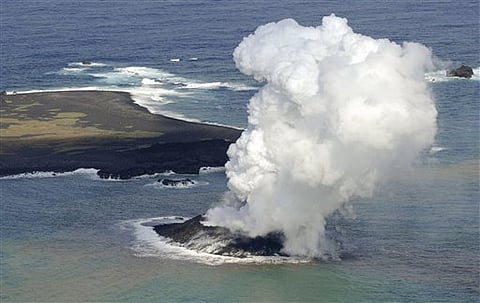 Volcano raises new island far south of Japan