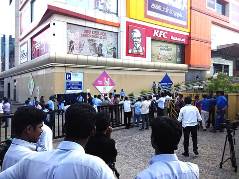 People were seen gathered outside the mall as the bomb squad searched the mall for a bomb after an anonymous call | Prajeet Nair