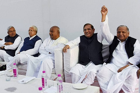 JD U leaders Nitish Kumar and Sharad Yadav RJD chief Lalu Prasad Yadav and JD S chief H D Deve Gowda during a meeting at Samajwadi Party chief Mulayam Singh Yadav's Delhi residence for the formation of a new alliance against the government in New Delhi o
