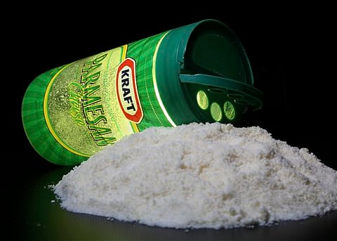 A package of Kraft parmesan cheese. | AP