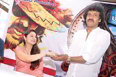 Upendra with wife Priyanka at the press meet. | ENS