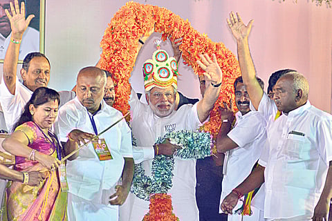 Lottery Kingpin’s Wife Shares Stage with Graft-Flayer Modi