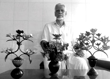 Coconut Shells Turn Artefacts in His Hands