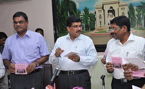 Osmania University vice-chancellor S Satyanarayan (middle) releasing the results of OUCET-2014 in Hyderabad on Tuesday in the presence of registrar K Pratap Reddy (left) and director Sivaji Rai | A Radhakrishan.