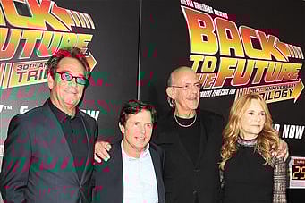 Huey Lewis, from left, Michael J. Fox, Christopher Lloyd and Lea Thompson arrive at the "Back To The Future" 30th Anniversary celebration. |AP