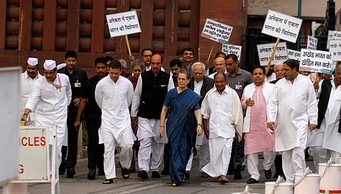 Sonia Gandhi and Rahul Gandhi along with other Congress leaders marching to Rashtrapati Bhavan, New Delhi on Tuesday to make an appeal to President Pranab Mukherjee to use his constitutional powers to end the "atmosphere of intolerance." | Express photo