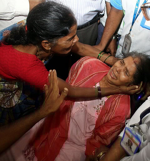 Kasthuri Munirathinam, the Indian maid whose hand was chopped off by her Saudi Arabian employer last month arrives at Chennai airport on Saturday | Express Photo- Martin Louis