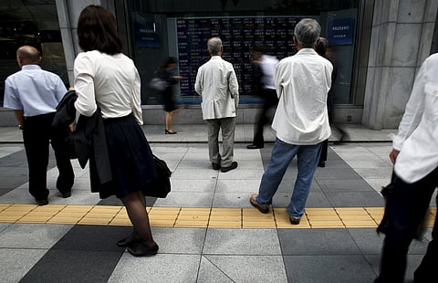 Asia Shares Slip on Greek Default Fears, Fed Awaited