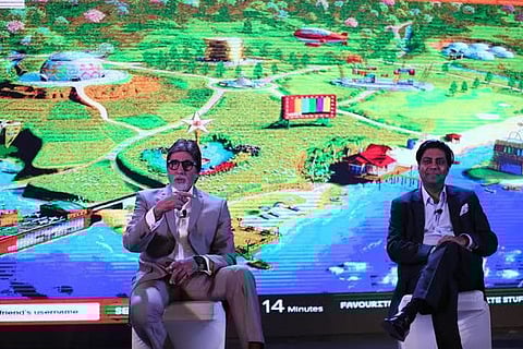 Amitabh Bachchan unveils Worldoo.com, an online ecosystem for children, with the site’s founder Monish Ghatalia.