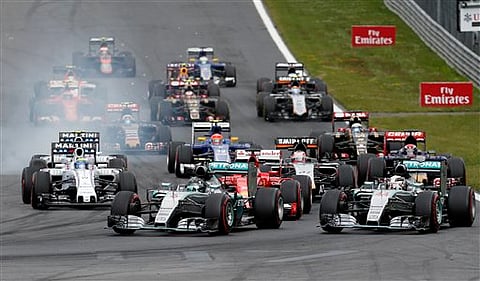 Mercedes driver Nico Rosberg of Germany, center left, steers his car steers his car on the start of the the Formula One Grand Prix race, at the Red Bull Ring in Spielberg, southern Austria. | AP