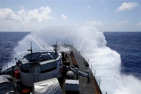 The Belgian Navy Vessel Godetia breaks waves during a migrants search and rescue mission in the mediterranean sea off the Sicilian coasts, Italy. |AP