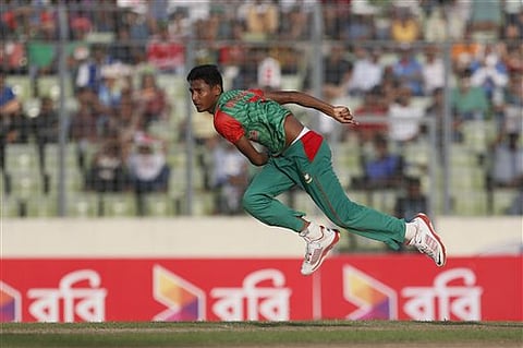 Bangladesh’s Mustafizur Rahman bowls against India during their second one-day international cricket match in Dhaka, Bangladesh. |AP