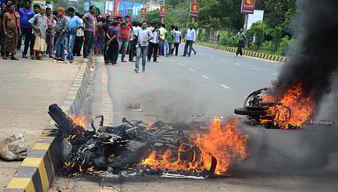 Local people burned two motor bike during the Odisha Bandh sponsedred by Odisha Pradesh Congress in Bhubaneswar on Friday | Express photo by Biswanath Swain 