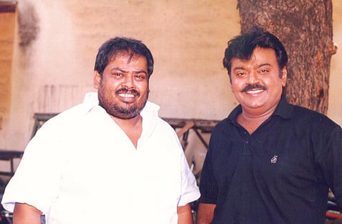 Left, Ibrahim Rowther with Vijayakanth. (File)