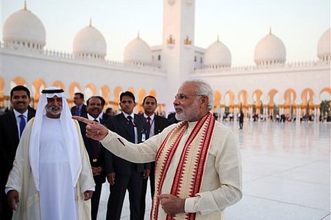 Modi, right, visits the Sheikh Zayed Grand Mosque with Sheikh Hamdan bin Mubarak Al Nahyan, UAE Minister of Higher Education and Scientific Research, second left, during the first day of a two-day visit to the UAE | AP