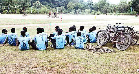Members of the Kerala Cycle Polo Association waiting outside the Eloor School ground to participate in the National Cycle Polo Championship on Friday | Melton Antony