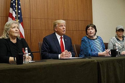 Republican presidential candidate Donald Trump, second from left, make remarks before the second presidential debate with Democratic presidential candidate Hillary Clinton | AP