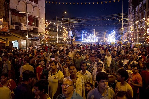 People watch a Dussehra procession in Allahabad, as the festival celebrates the victory of good over evil. (Photo | AP)