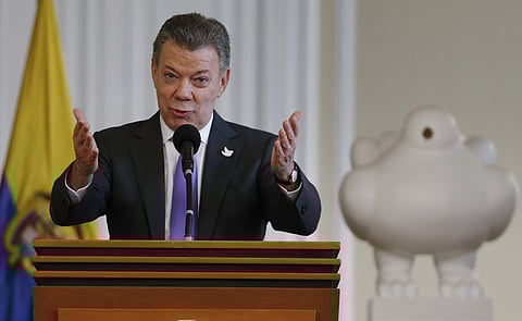 Colombia's President Juan Manuel Santos speaks to supporters of the peace deal he signed with rebels of the Revolutionary Armed Forces of Colombia. | AP
