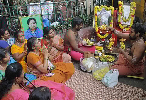 AIADMK party members make a special prayer to Saibaba for CM Jayalalithaa's speedy recovery on Thursday at Apollo hospital in Chennai. | EPS