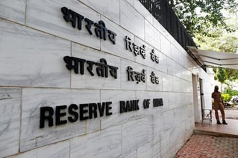 A police officer stands guard in front of the Reserve Bank of India (RBI) head office in Mumbai, India, August 9, 2016. | Reuters