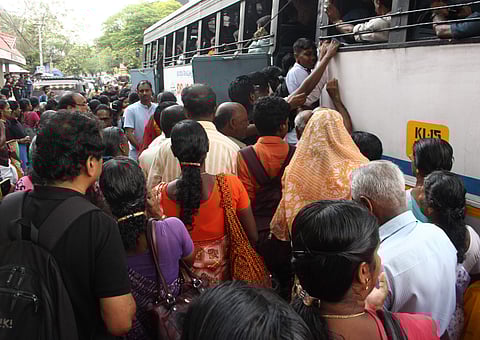 A KSRTC bus packed full with people. | EPS